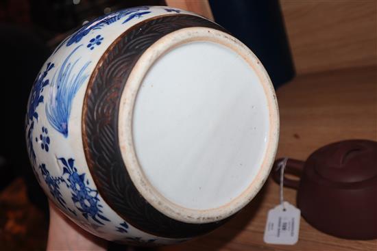 A Chinese squat baluster vase, crackle-glazed in green and red, a blue and white ginger jar and cover and a redware teapot